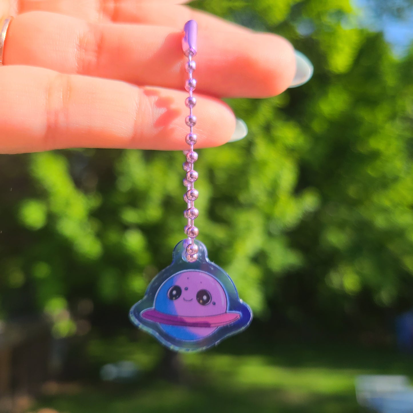 Mini space charm